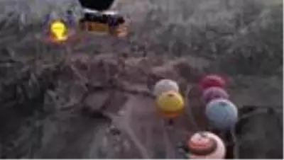 Kapadokya'da sıcak hava balonları kadına şiddete tepki için havalandı Kapadokya'da sıcak hava balonları kadına şiddete tepki için havalandı