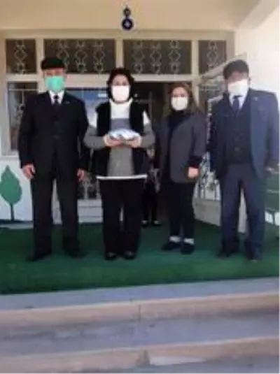 Çifteler'de muhtarların Öğretmenler Günü ziyaretleri Çifteler'de muhtarların Öğretmenler Günü ziyaretleri