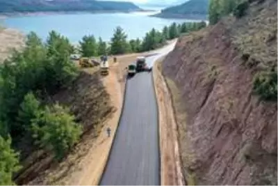 Komşu iki şehirden ortak asfalt çalışması Komşu iki şehirden ortak asfalt çalışması