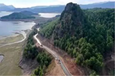 Komşu iki şehirden ortak asfalt çalışması Komşu iki şehirden ortak asfalt çalışması