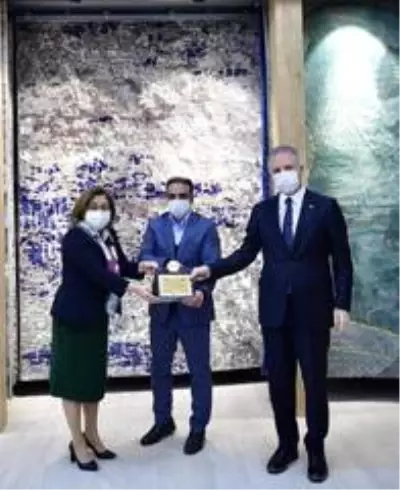 Yasin Kaplan Halıya teşekkür plaketi Yasin Kaplan Halıya teşekkür plaketi