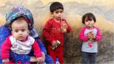 Evi yanan Suriyeli kadının imdadına İHA muhabirleri koştu Evi yanan Suriyeli kadının imdadına İHA muhabirleri koştu