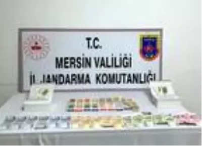 Mersin'de kumar oynarken yakalanan 11 kişiye 79 bin lira ceza Mersin'de kumar oynarken yakalanan 11 kişiye 79 bin lira ceza