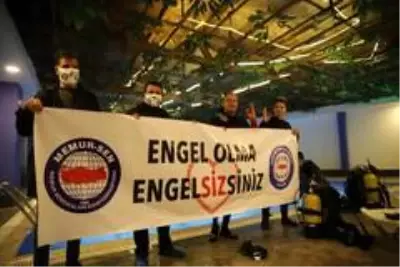 Ortopedik engeline rağmen farkındalık için dalış yaptı Ortopedik engeline rağmen farkındalık için dalış yaptı