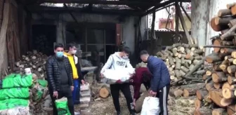 Taşova'da 'İyilik Hareketi' üyelerinden ihtiyaçlı ailelere odun yardımı