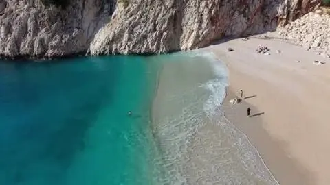 Dünyaca ünlü Kaputaş Plajı'nda deniz, kum ve güneş keyfi Dünyaca ünlü Kaputaş Plajı'nda deniz, kum ve güneş keyfi