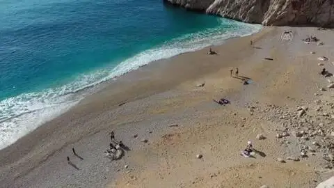 Dünyaca ünlü Kaputaş Plajı'nda deniz, kum ve güneş keyfi Dünyaca ünlü Kaputaş Plajı'nda deniz, kum ve güneş keyfi
