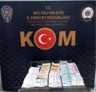 Sahte para ile alışveriş yapan 2 dolandırıcı Kocaeli'de yakalandı Sahte para ile alışveriş yapan 2 dolandırıcı Kocaeli'de yakalandı