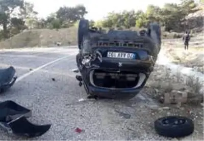 Takla atan araçtan hafif yaralı olarak kurtuldu Takla atan araçtan hafif yaralı olarak kurtuldu
