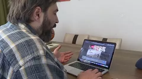 Gazeteci Kaan Kural, AA'nın Yılın Fotoğrafları oylamasına katıldı Gazeteci Kaan Kural, AA'nın Yılın Fotoğrafları oylamasına katıldı