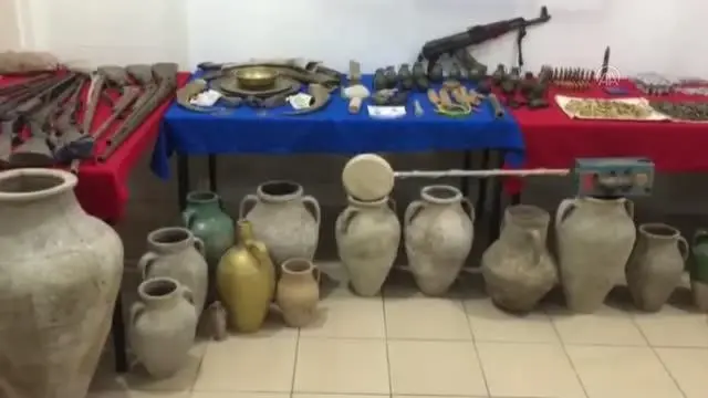 Kaçak kazı yaparken suçüstü yakalan zanlının evinden 'cephanelik' çıktı Kaçak kazı yaparken suçüstü yakalan zanlının evinden 'cephanelik' çıktı