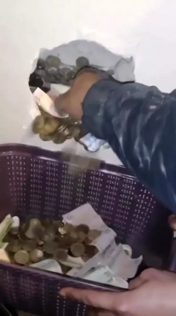Antalya'da, oturduğu dairenin duvarını kumbara yaptı Antalya'da, oturduğu dairenin duvarını kumbara yaptı