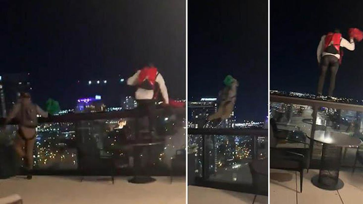 Otelin çatısından paraşütle atlayanlar paniğe neden oldu! O anlar kamerada