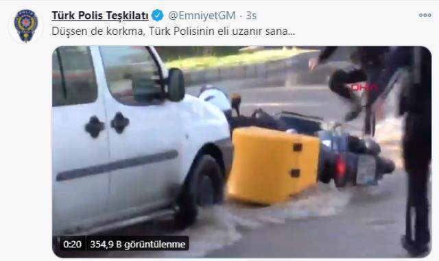 Motosikletiyle göle dönen yola düşen kuryenin yardımına iki polis yetişti