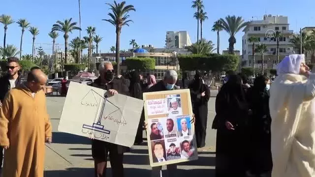 Libya'daki toplu mezar kurbanlarından kimliği tespit edilen 14'ü için cenaze namazı kılındı Libya'daki toplu mezar kurbanlarından kimliği tespit edilen 14'ü için cenaze namazı kılındı