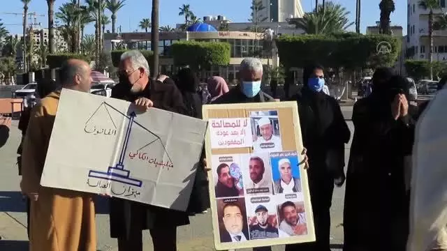 Libya'daki toplu mezar kurbanlarından kimliği tespit edilen 14'ü için cenaze namazı kılındı Libya'daki toplu mezar kurbanlarından kimliği tespit edilen 14'ü için cenaze namazı kılındı