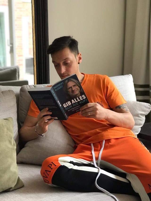 Editing of Mesut Özil's photo taken while reading a book drew reaction on social media Editing of Mesut Özil's photo taken while reading a book drew reaction on social media