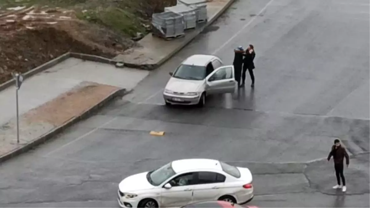 Başakşehir'de tartıştığı kadını zorla otomobile bindirmek isteyen kişiye çevredekiler engel oldu