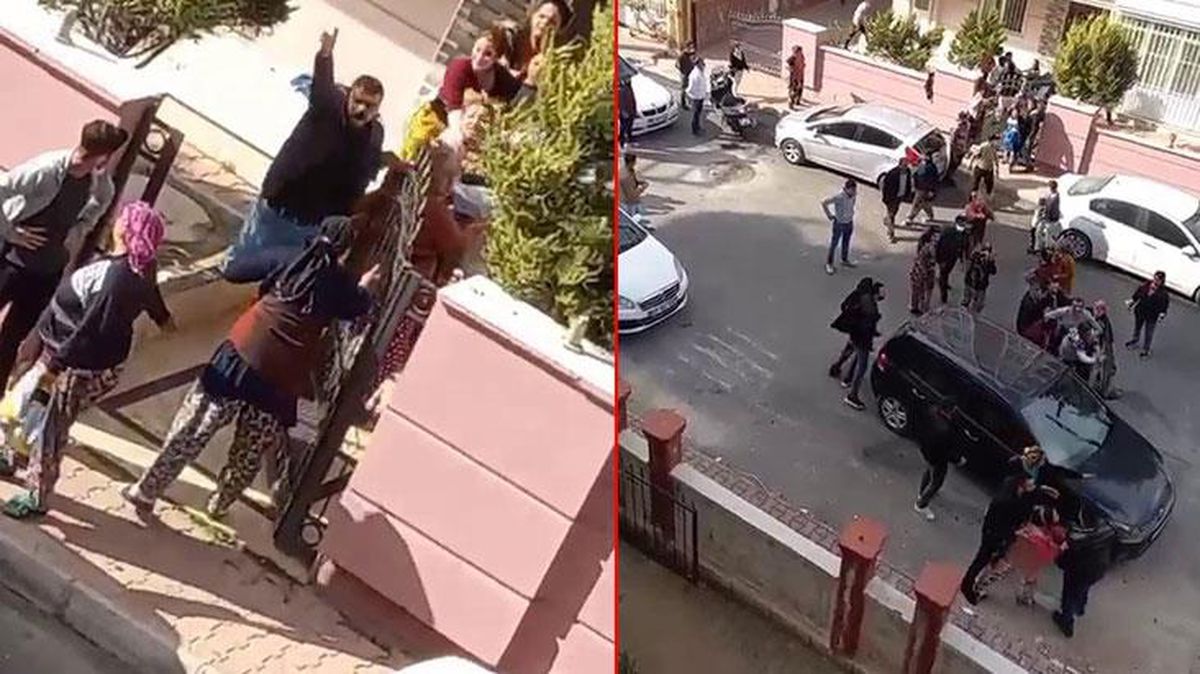 Komşu iki aile sokak ortasında birbirine girdi, ortalık savaş alanına döndü