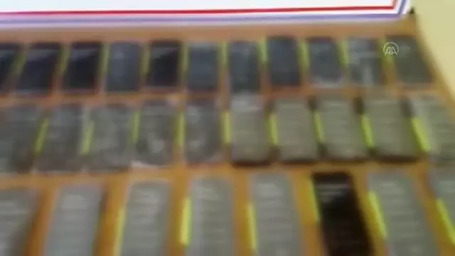 KAHRAMANMARAŞ - Yolcu otobüsünde kaçak cep telefonu ve uyuşturucu madde ele geçirildi KAHRAMANMARAŞ - Yolcu otobüsünde kaçak cep telefonu ve uyuşturucu madde ele geçirildi