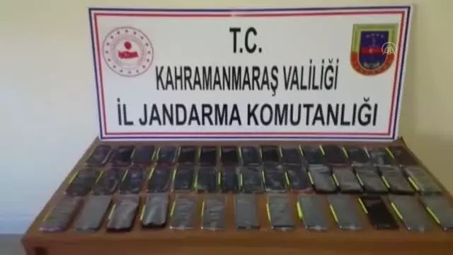KAHRAMANMARAŞ - Yolcu otobüsünde kaçak cep telefonu ve uyuşturucu madde ele geçirildi KAHRAMANMARAŞ - Yolcu otobüsünde kaçak cep telefonu ve uyuşturucu madde ele geçirildi