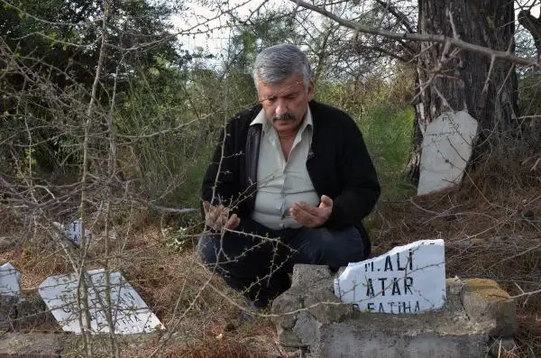 Aynı aileden 6 kişinin mezar taşı kırıldı Aynı aileden 6 kişinin mezar taşı kırıldı