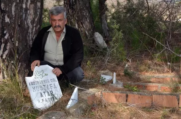 Aynı aileden 6 kişinin mezar taşı kırıldı Aynı aileden 6 kişinin mezar taşı kırıldı