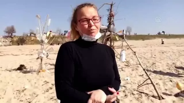 Komşu ülke sahillerinde aynı anda çöp toplandı Komşu ülke sahillerinde aynı anda çöp toplandı