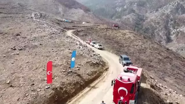 Pozantı'da yanan ormanlık alana kızılçam tohumu ekildi Pozantı'da yanan ormanlık alana kızılçam tohumu ekildi