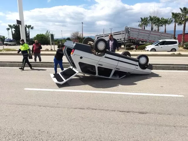 Takla atan otomobilden hafif yaralı kurtuldu Takla atan otomobilden hafif yaralı kurtuldu