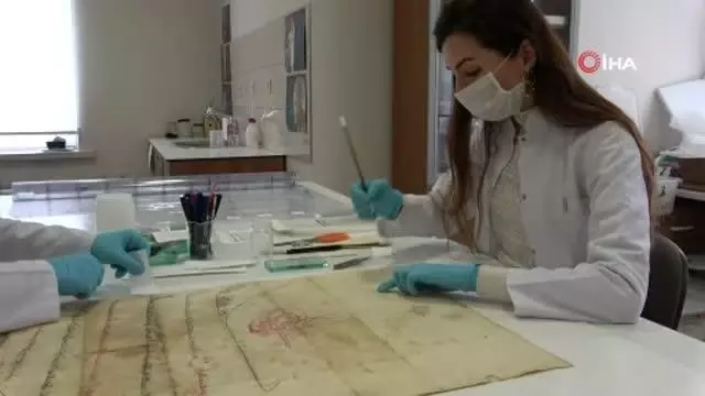 Tesadüfen bulunan padişah fermanının restorasyonu tamamlandı Tesadüfen bulunan padişah fermanının restorasyonu tamamlandı