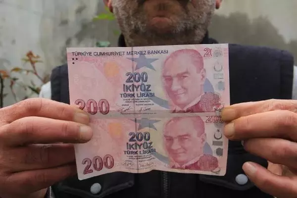 Hatalı basım 200 TL'yi, 55 bin TL'ye satışa çıkardı Hatalı basım 200 TL'yi, 55 bin TL'ye satışa çıkardı