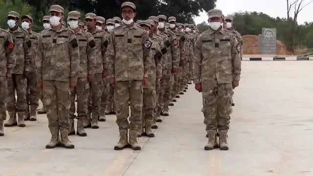 Libya'da TSK'nin terörle mücadele eğitimi verdiği askeri öğrenciler törenle mezun oldu Libya'da TSK'nin terörle mücadele eğitimi verdiği askeri öğrenciler törenle mezun oldu