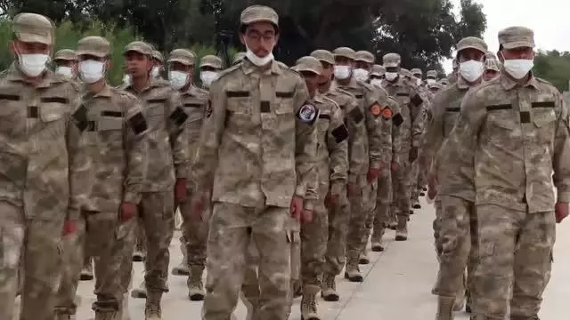 Libya'da TSK'nin terörle mücadele eğitimi verdiği askeri öğrenciler törenle mezun oldu Libya'da TSK'nin terörle mücadele eğitimi verdiği askeri öğrenciler törenle mezun oldu