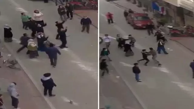 İki aile arasındaki tartışma meydan savaşına döndü! Baltalı, sopalı kavga kamerada İki aile arasındaki tartışma meydan savaşına döndü! Baltalı, sopalı kavga kamerada