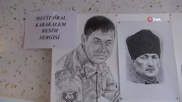 Güvenlik görevlisi karakalem sergisinde şehitlerimizi unutmadı Güvenlik görevlisi karakalem sergisinde şehitlerimizi unutmadı