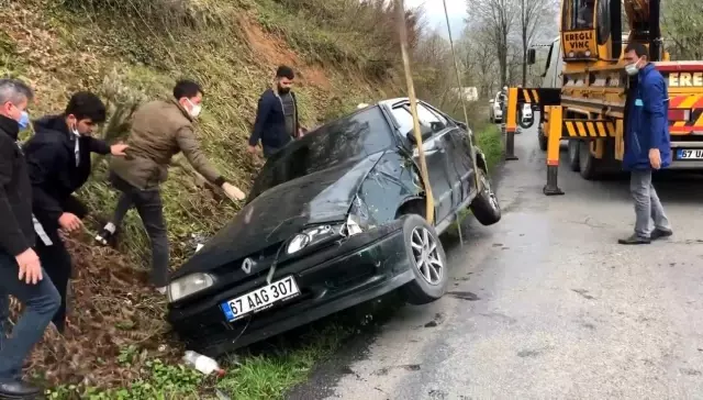 Son Dakika | Şarampole yuvarlanan otomobilde ölümden döndüler