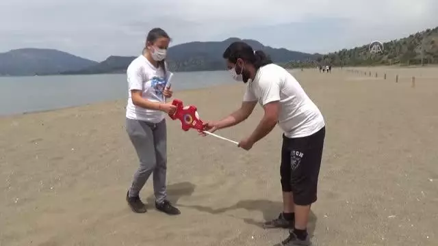 Dünyaca ünlü İztuzu sahilinin konukları caretta carettalar yumurta bırakmaya başladı Dünyaca ünlü İztuzu sahilinin konukları caretta carettalar yumurta bırakmaya başladı