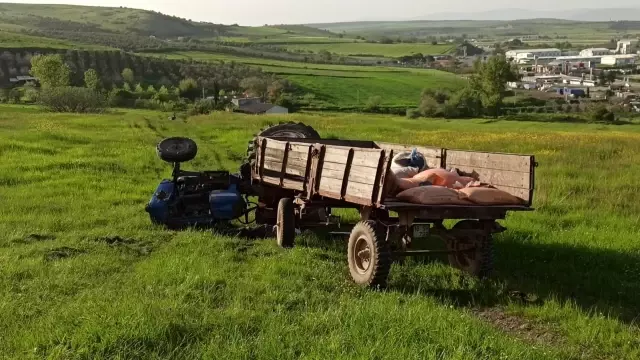 Devrilen traktörün altında kalarak can verdi Devrilen traktörün altında kalarak can verdi