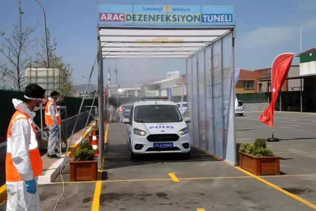 Sultanbeyli'de tam kapanma döneminde kamu araçları araç dezenfeksiyon tünelinde temizlendi