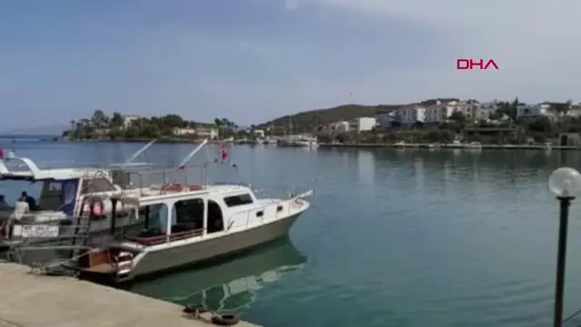 DATÇA'DA YASAĞA RAĞMEN DENİZE GİRENLERE CEZA KESİLDİ DATÇA'DA YASAĞA RAĞMEN DENİZE GİRENLERE CEZA KESİLDİ