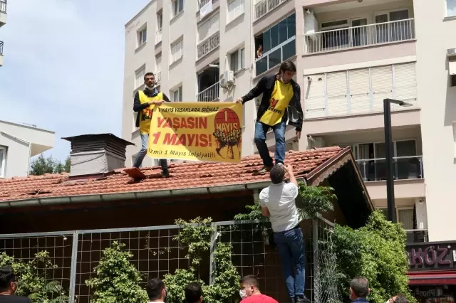 Kendisini çatıdan indirmek isteyen polise 'Belki Covidsin; gelme' diye bağırdı