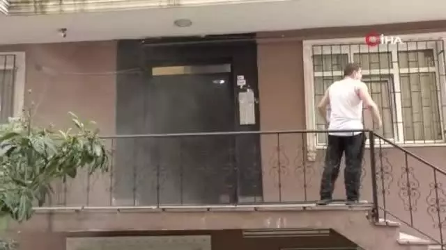 Yangından kedisiyle birlikte kaçtı Yangından kedisiyle birlikte kaçtı
