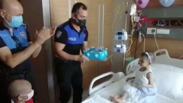 Polisten, lösemi tedavisi gören minik Miray'a doğum günü sürprizi