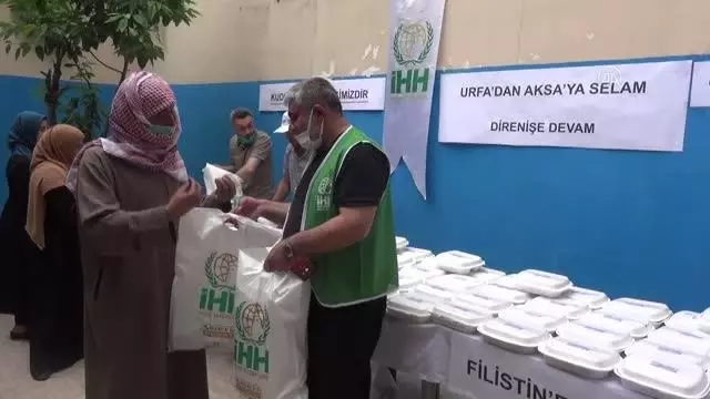 ŞANLIURFA - İhtiyaç sahibi ailelere iftariyelik dağıtıldı ŞANLIURFA - İhtiyaç sahibi ailelere iftariyelik dağıtıldı