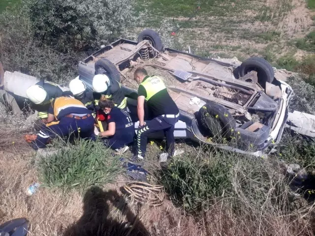 Takla atan otomobilin sürücüsü yaralandı Takla atan otomobilin sürücüsü yaralandı