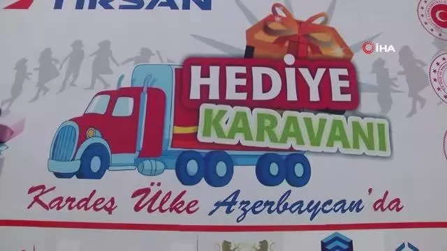 Türkiye'nin şehit çocukları için yolladığı 'Hediye Karavanı' tırı Azerbaycan'ı dolaşıyorHediye Karavanı, Gedebey kentinde çocuklarla buluştu