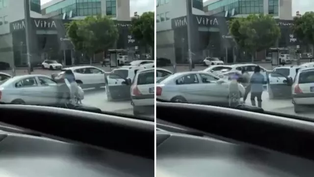 İki kadın trafikte saç başa kavga etti! Trafiği kilitleyen kavga anı kamerada İki kadın trafikte saç başa kavga etti! Trafiği kilitleyen kavga anı kamerada