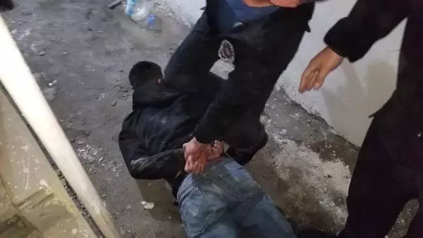 KÜTAHYA ŞEHİT ANNESİNİ DOLANDIRMAYA KALKTI, TORUNU VE OĞLUNA YAKALANDI
