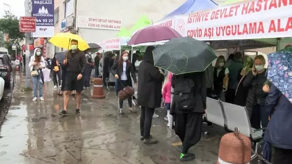YAĞMURA ALDIRMADILAR AŞI İÇİN BEKLEDİLER